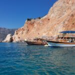 Dhow cruise sailing through fjords during Khasab Musandam tour from Dubai