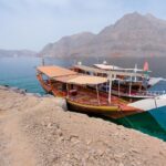 Family enjoying a Khasab dhow cruise during a Musandam trip from Dubai
