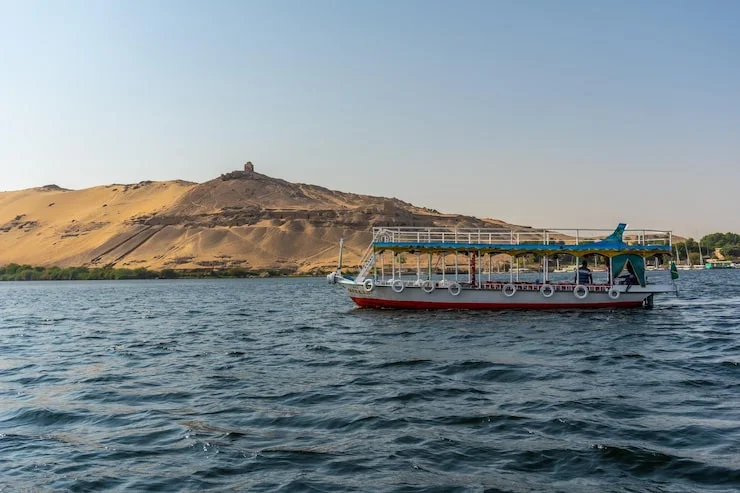 Traditional dhow cruise sailing through the fjords of Musandam Peninsula