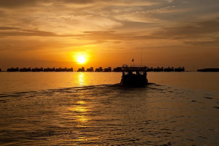 Traditional dhow during a Musandam overnight tour from Dubai with scenic fjords and turquoise waters