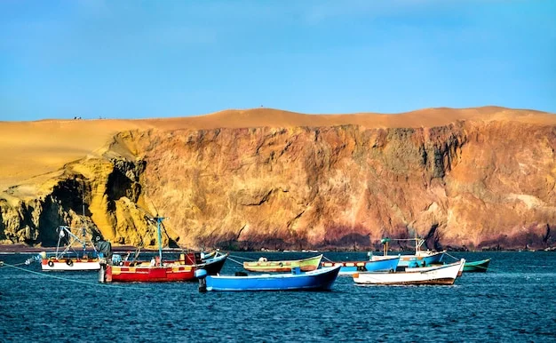 Traditional dhow cruising through Khasab Musandam fjords